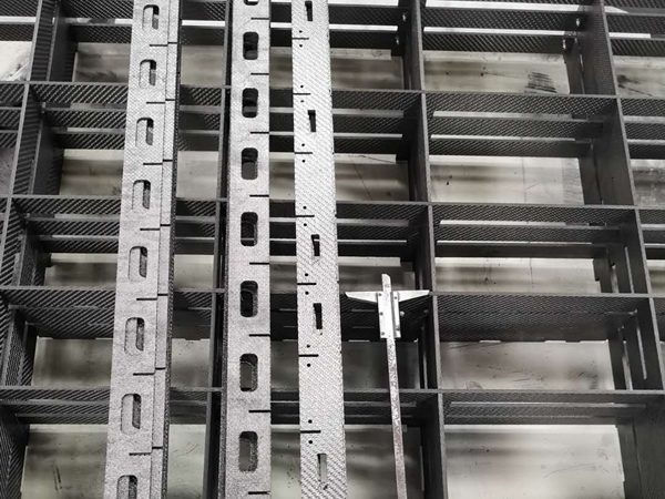 CFC fixtures are placed for assembly.