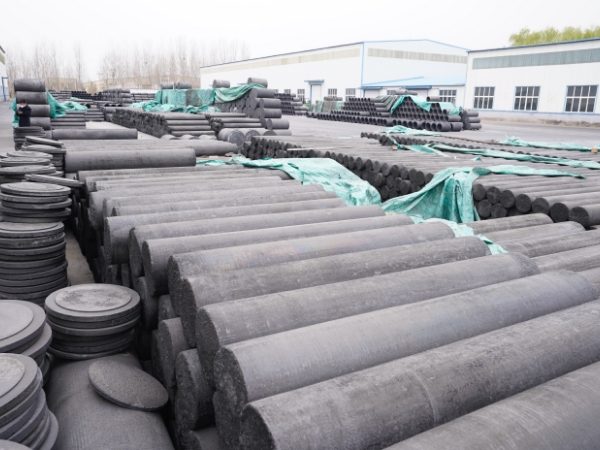 Many graphite products are placed in the factory yard.