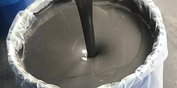A barrel of opened graphite emulsion