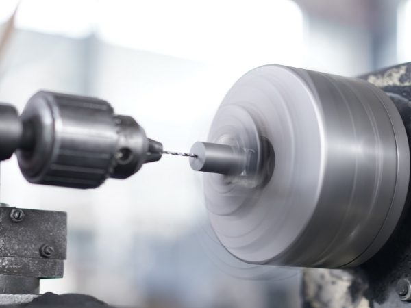 The equipment is processing the graphite column.