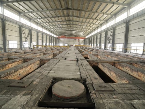 Large furnaces for graphite roasting.