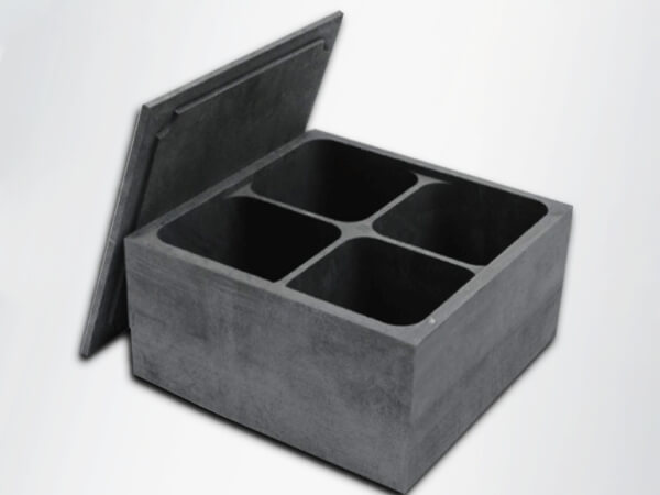 A graphitized graphite crucible with 4 openings and a lid