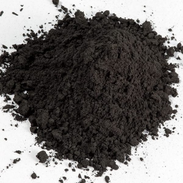 A pile of micro powder graphite is placed on a piece of paper.