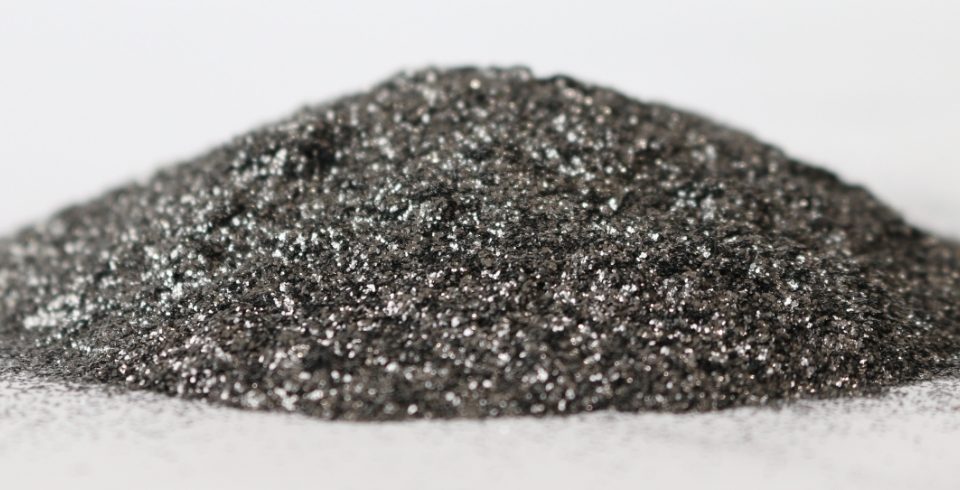 A pile of natural flake graphite