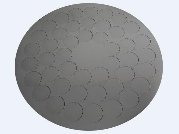 A SIC coated graphite tray at a light color background.