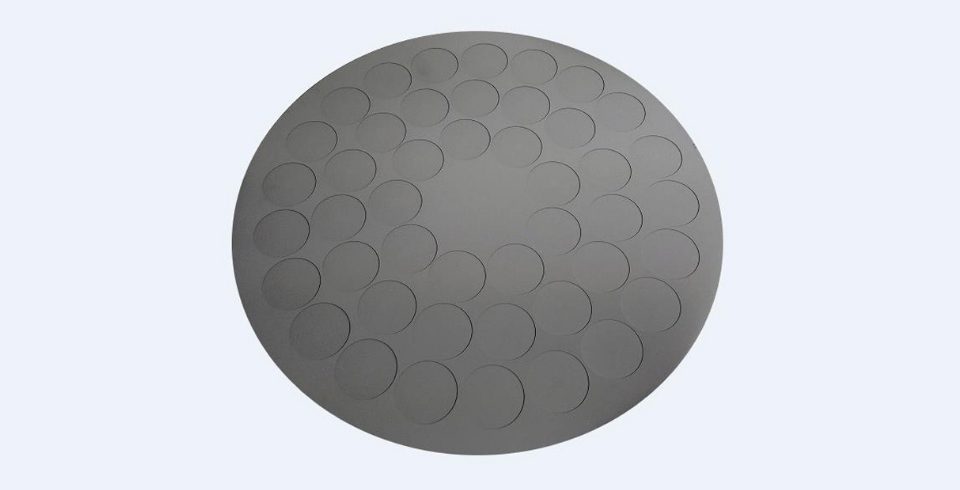 A SIC coated graphite tray at a light color background.