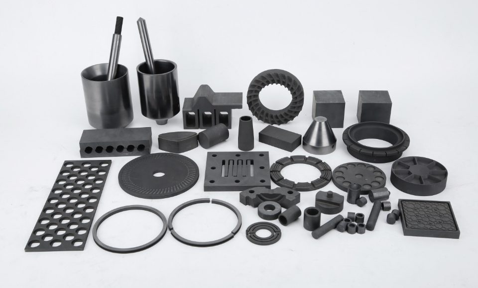 Graphite products with different shapes and uses are placed together.